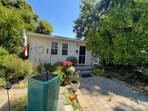 Casitas with pool featuring gardens and chickens